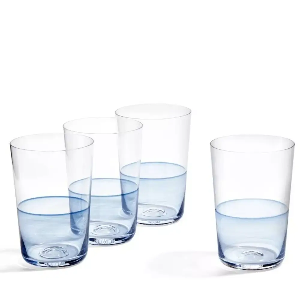 Set of four clear glasses