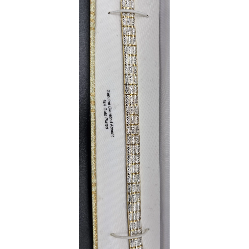 Diamond earring in a box with 'Cartier' branding