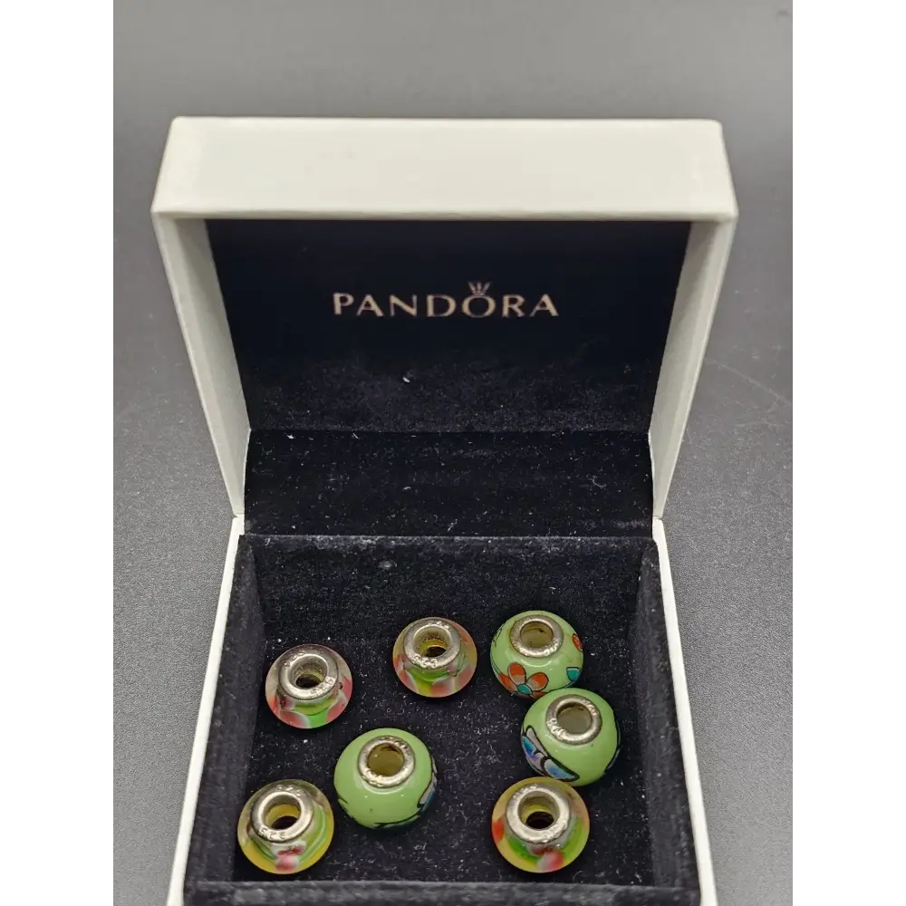 Set of colorful Pandora beads in a branded box