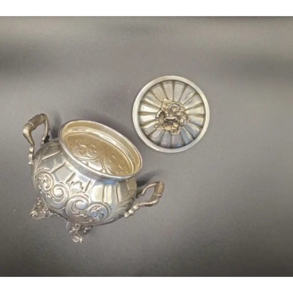 Decorative silver container with lid