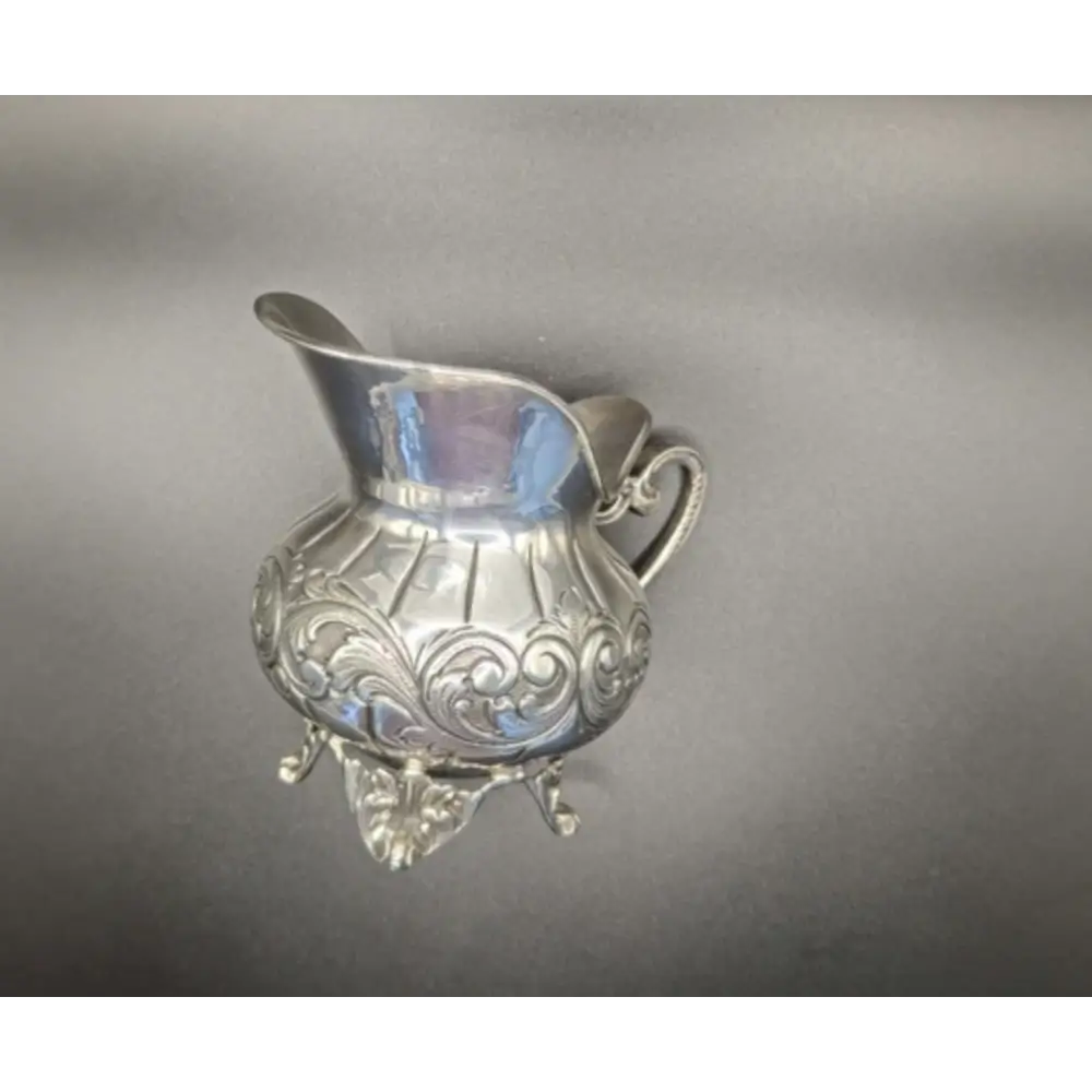 Decorative silver pitcher