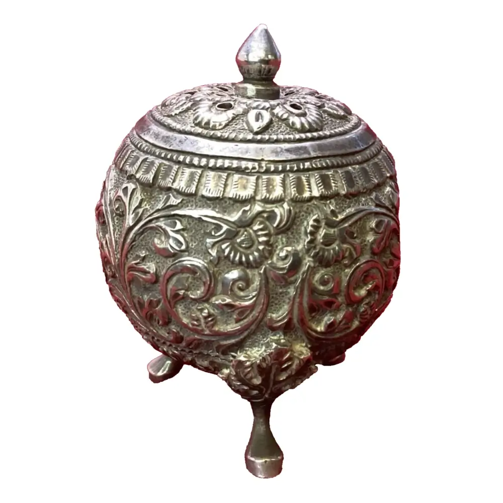 Indian silver saltshaker with intricate detailing