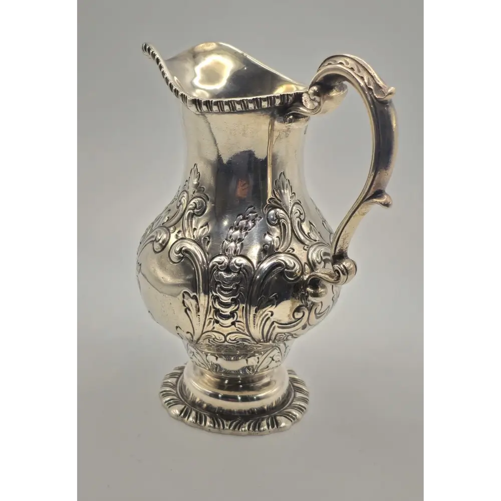 Decorative silver pitcher