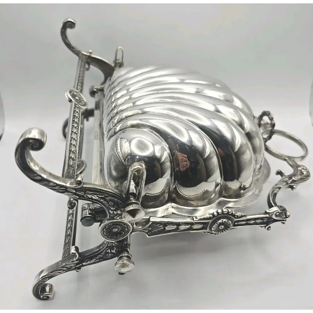 Silver decorative item with intricate design