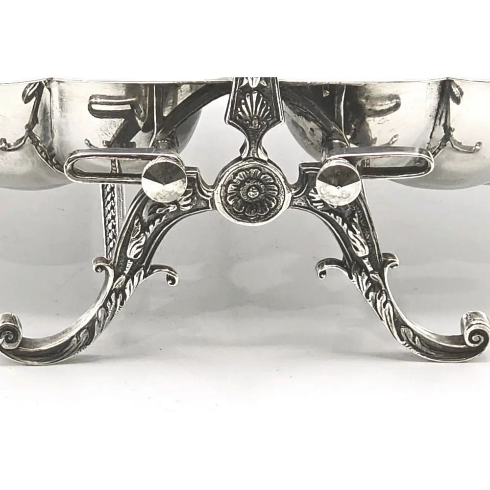 Silver decorative item with intricate designs
