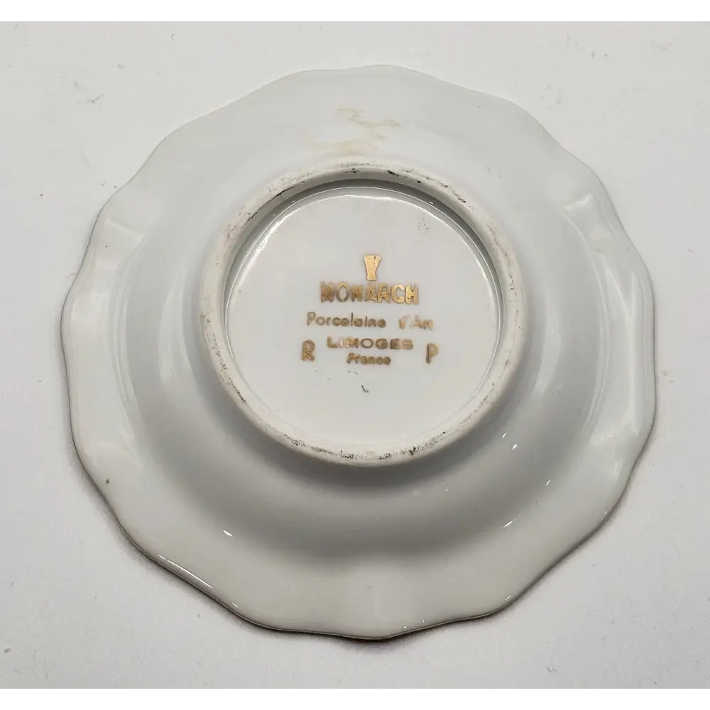 Back of a white ceramic Ashtray