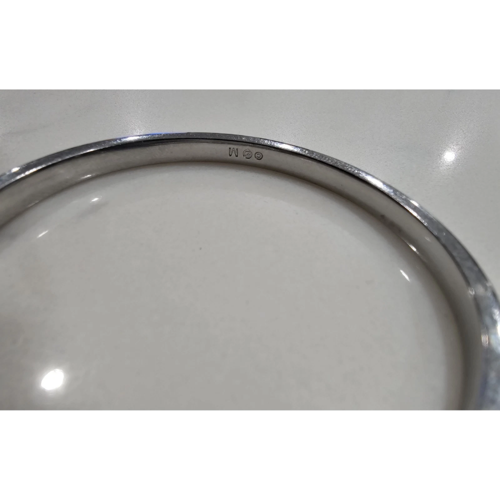 Silver bracelet on a white background