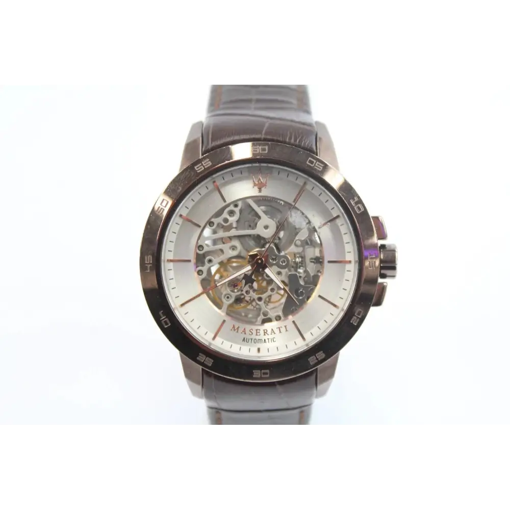 Maserati watch with a white face and metallic band