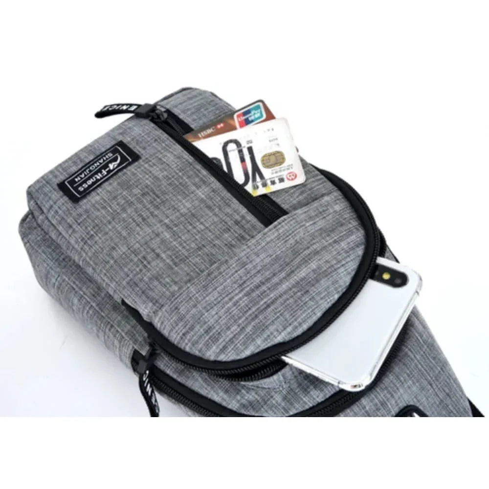 Gray body bag with phone and cards