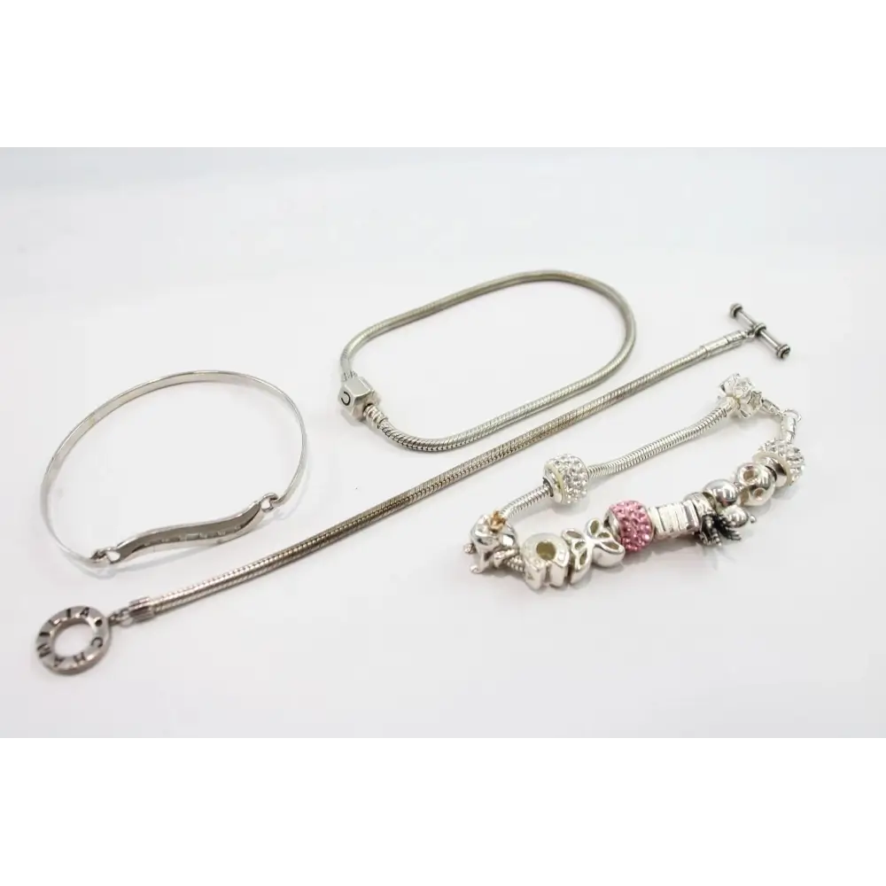 Silver bracelet with charms