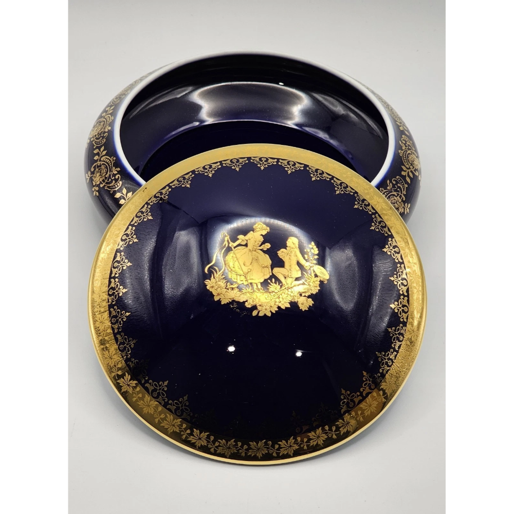 Navy blue dish with gold decorative elements