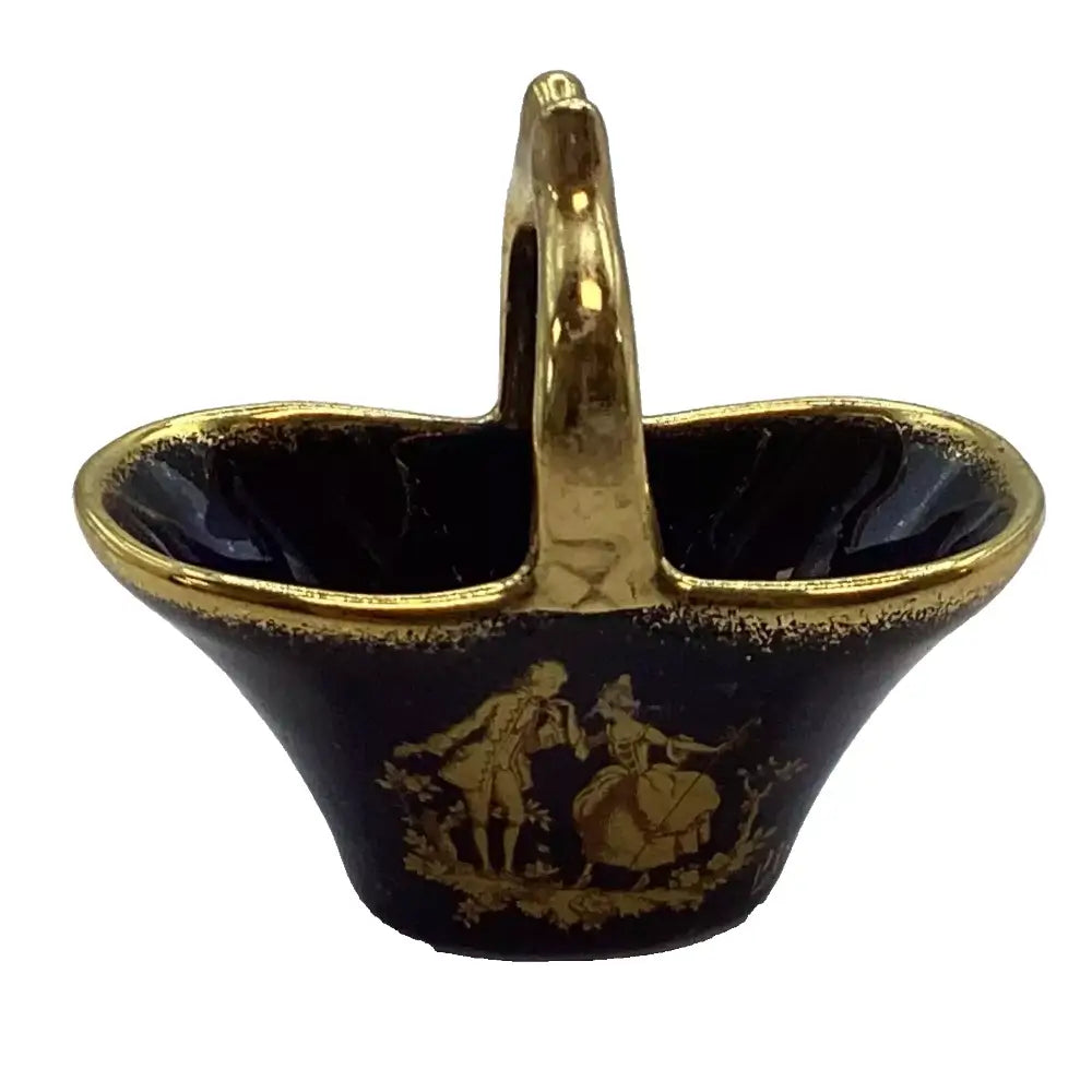 Decorative black basket with gold handle