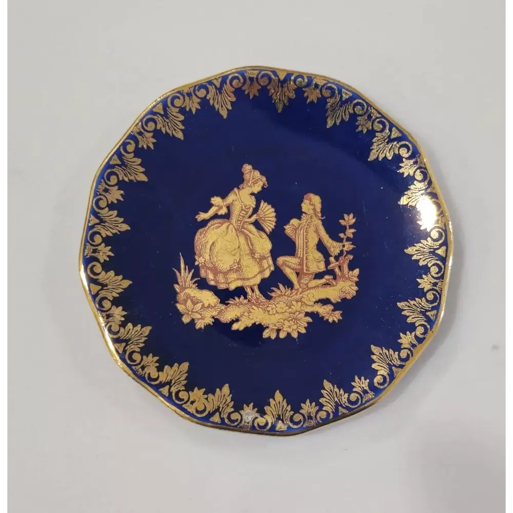 Decorative plate with gold embossed design