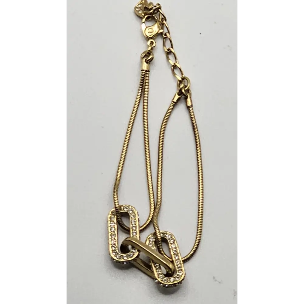 Gold necklace with a key pendant