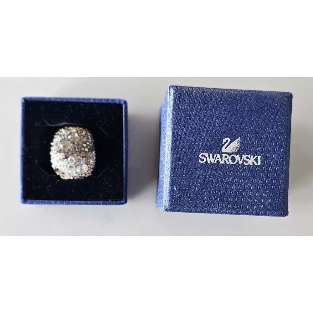 Swarovski ring in a blue box on a white background