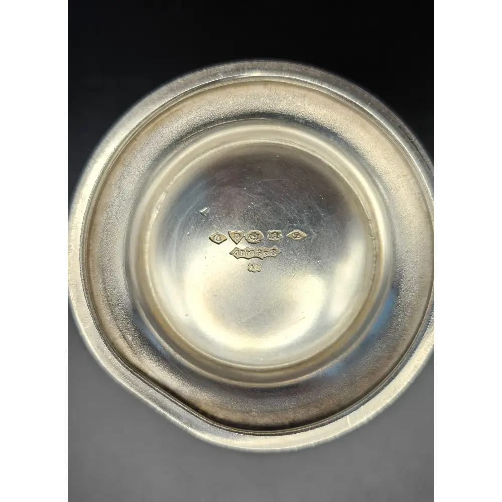 Close-up of a silver bowl with engraved details