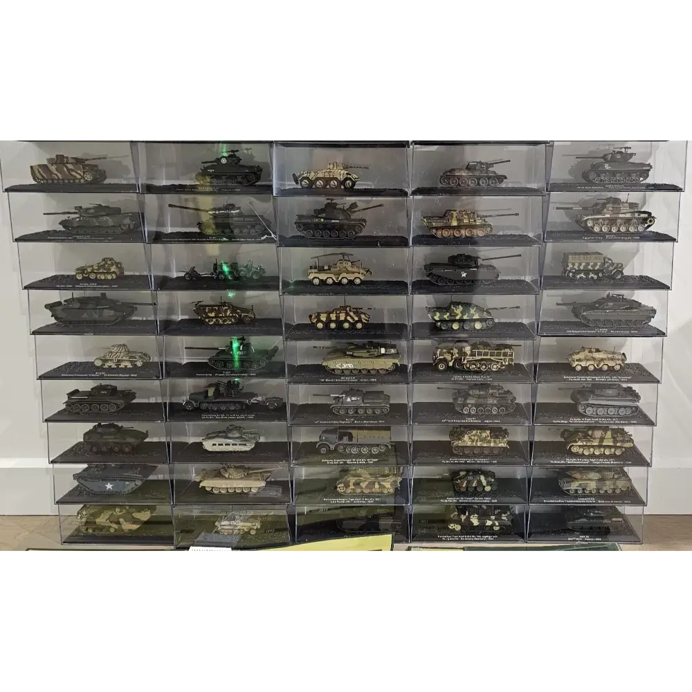 Collection of model tanks displayed in a clear plastic case.