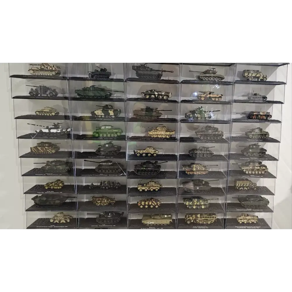Collection of model tanks displayed in a clear case against a white background