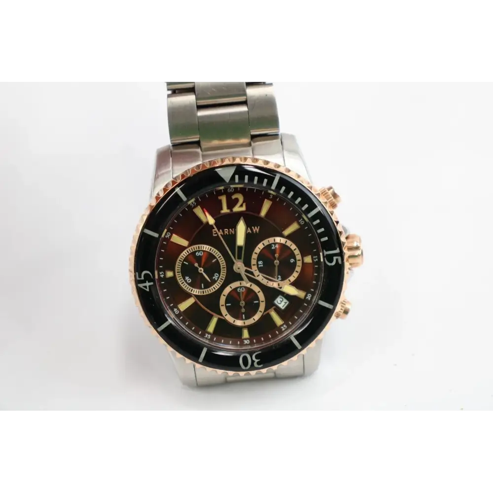 Silver and rose gold watch with a brown dial