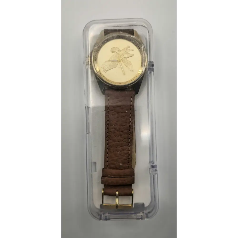 Watch with brown leather strap and gold face