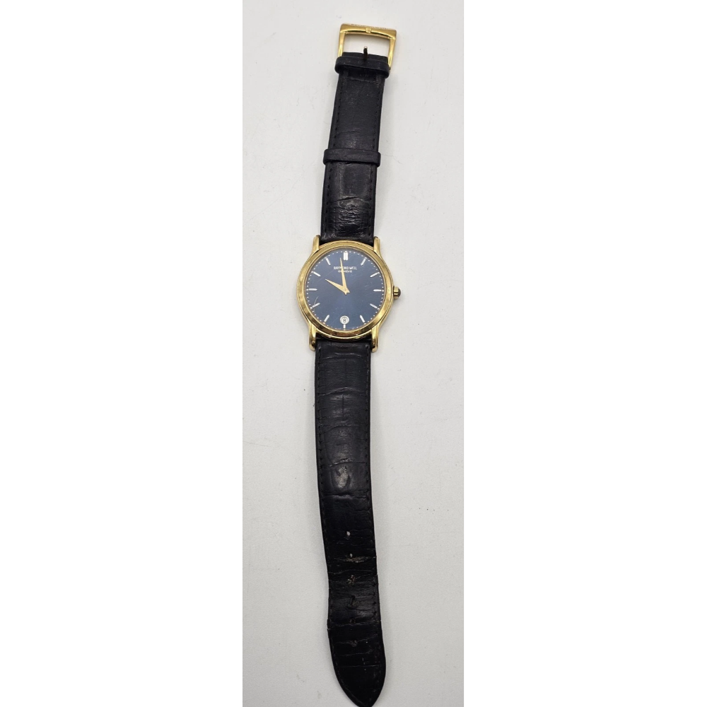 Wristwatch with black strap and gold case