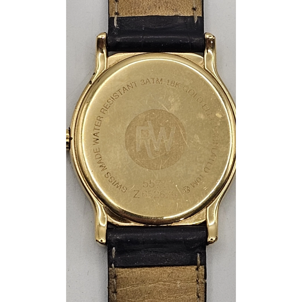 Gold watch with black leather strap on a white background