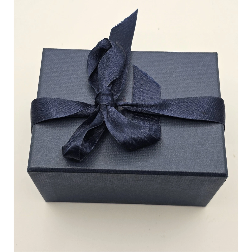 Navy blue gift box with a navy ribbon