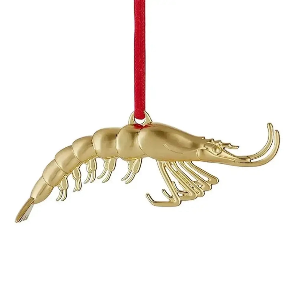 Gold shrimp ornament on a red string