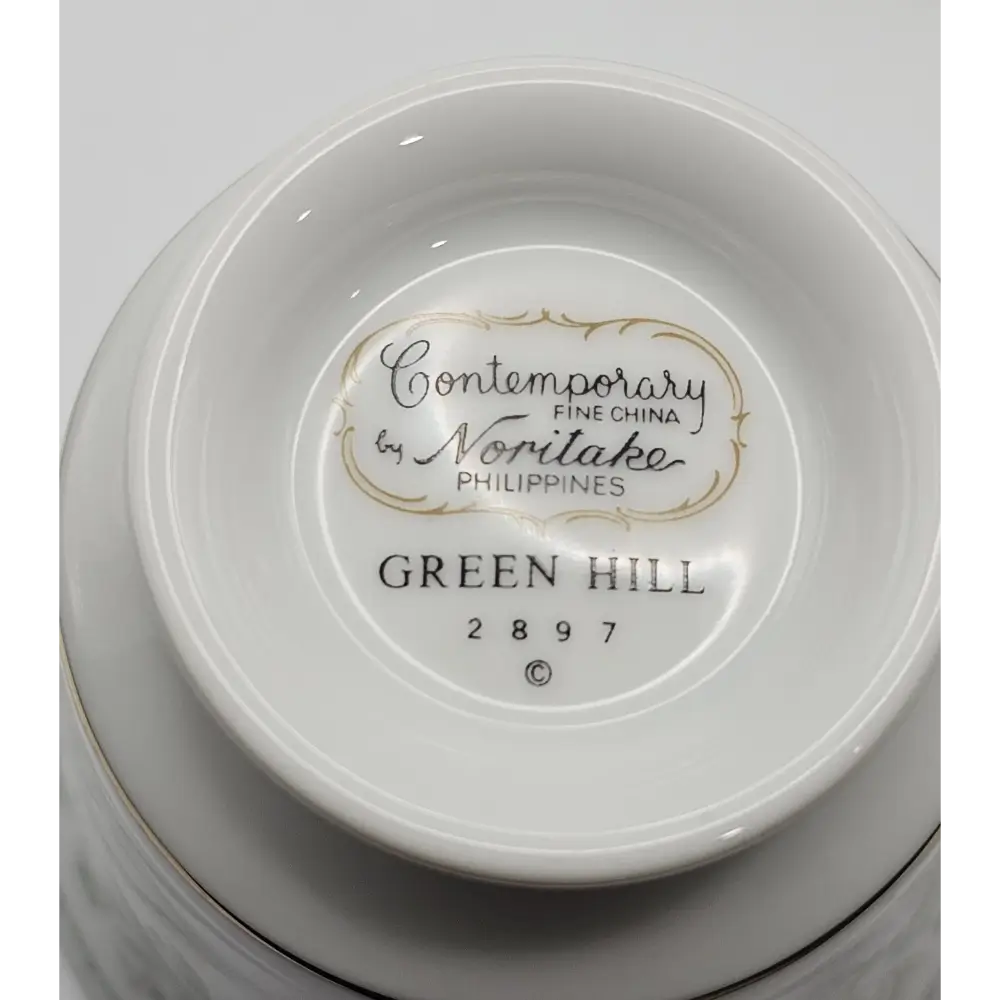 Close-up of a white ceramic bowl with 'Contemporary Fine China by Noritake Philippines' label.