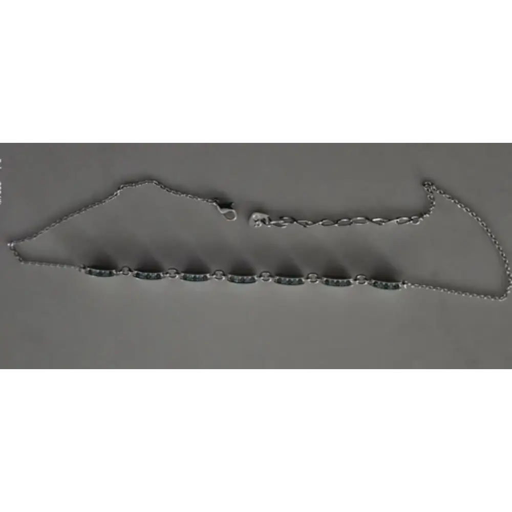 Silver chain on a gray background