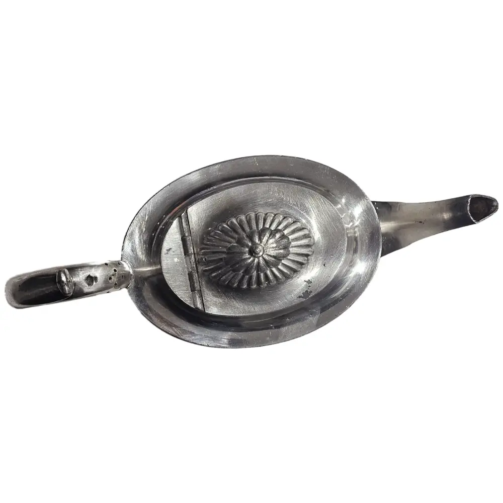 Vintage metal tea strainer
