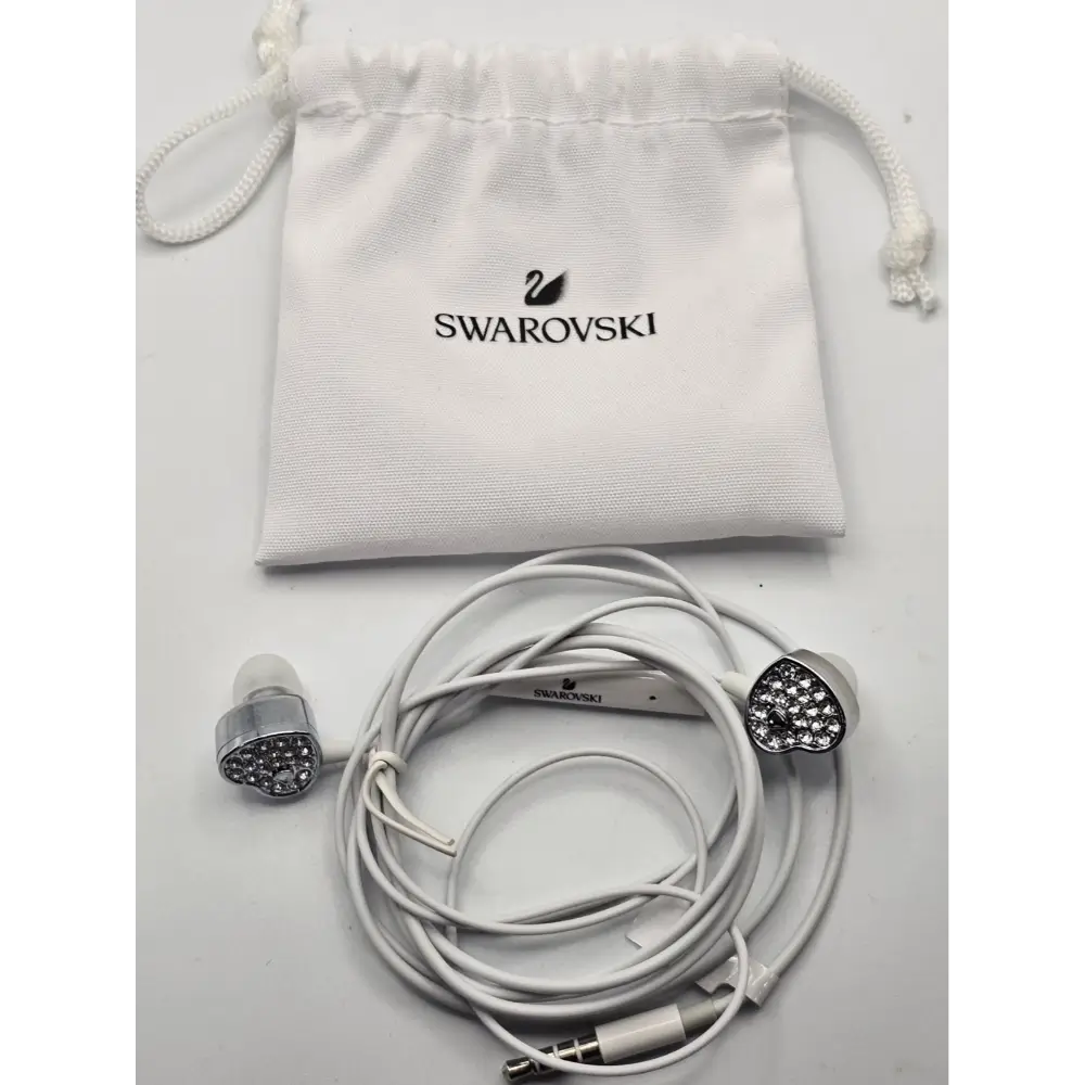 Swarovski branded earphones with a white drawstring pouch