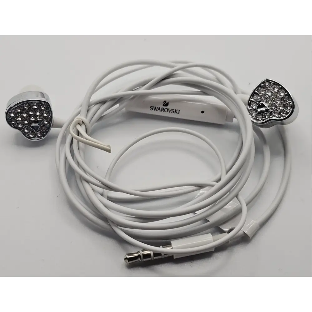 White earbud headphones with Swarovski logo
