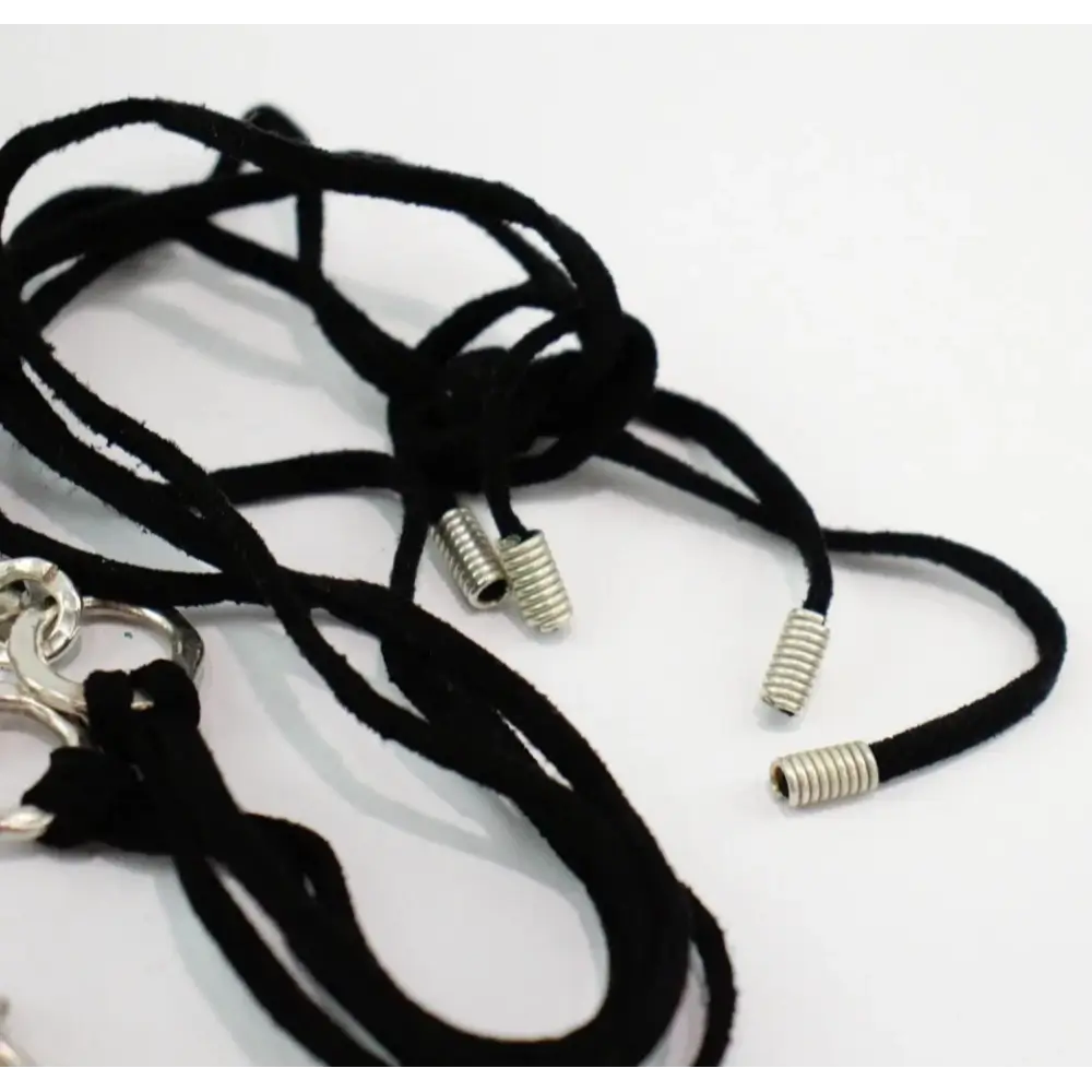 Black lanyards with metal ends on a white background