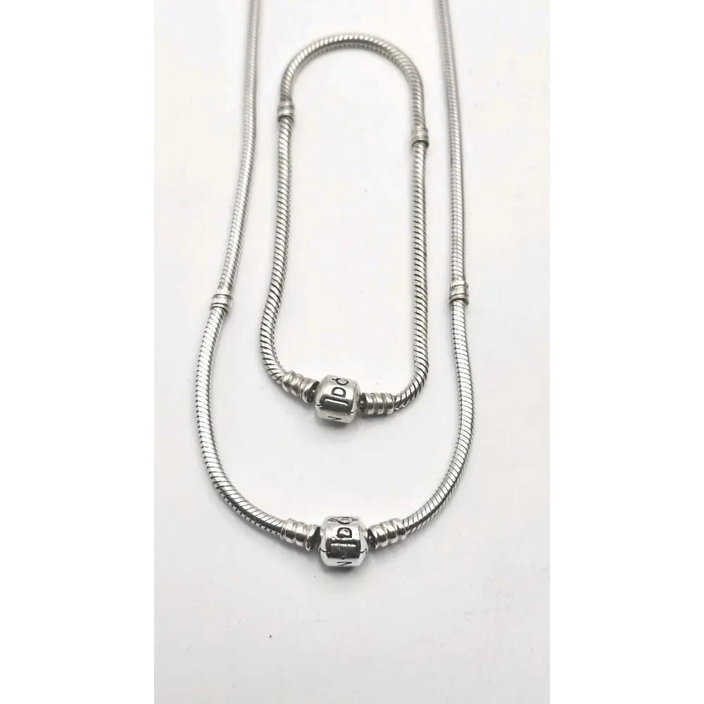 Two silver snake chain necklaces