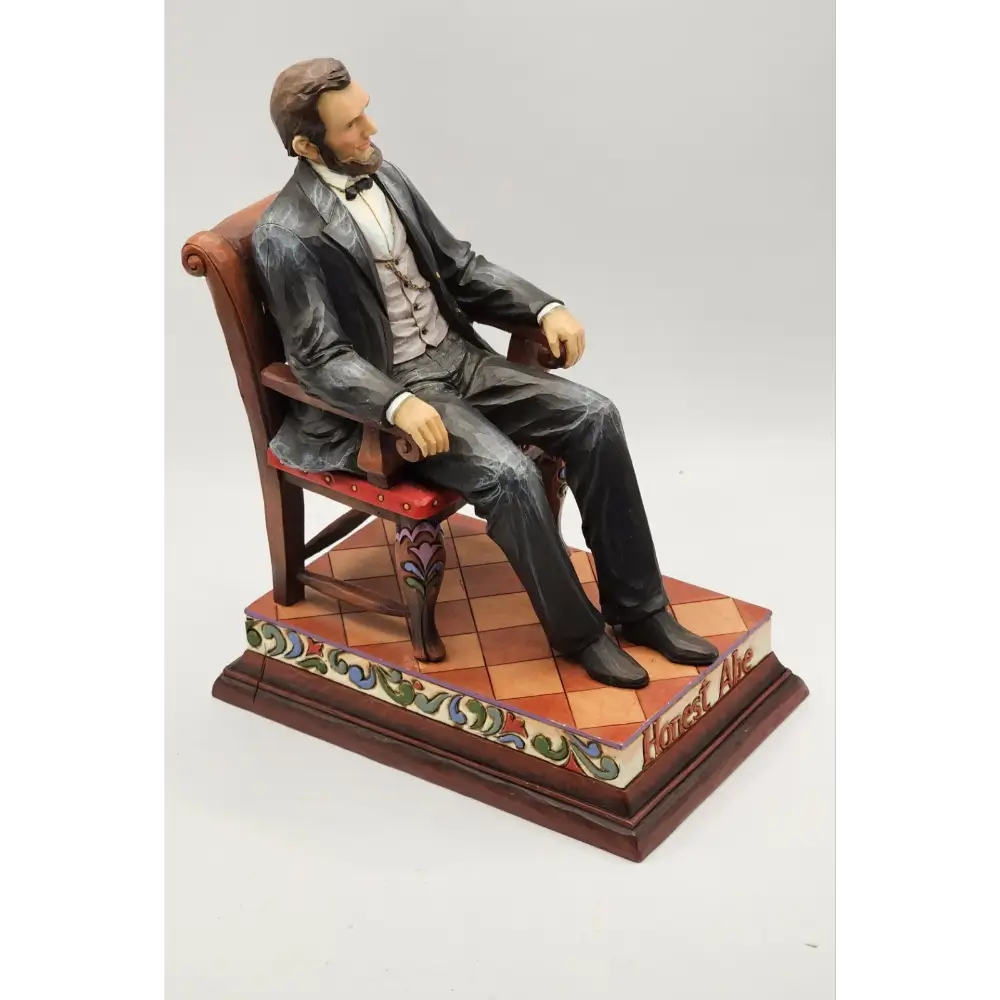 Statue of a man in formal attire