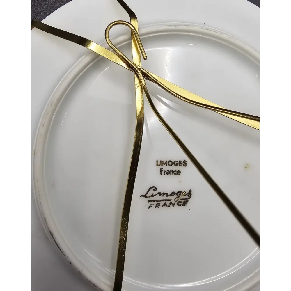 Close-up of a Limoges France plate with gold accents
