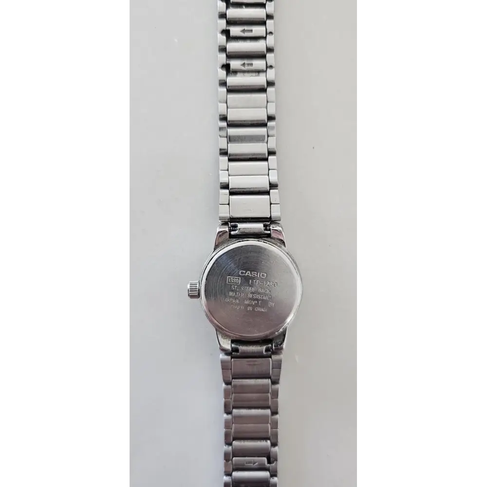 Silver Casio watch on a white background