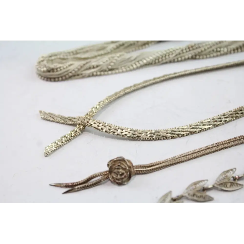 Gold necklaces with floral designs