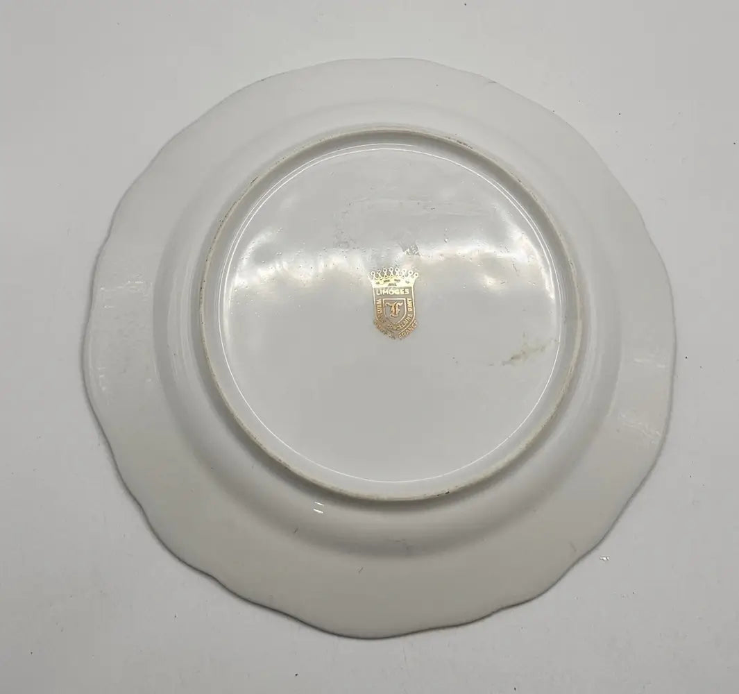 White ceramic plate with a visible brand logo