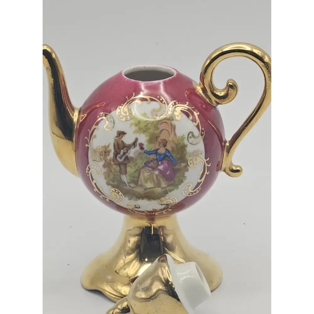 Decorative teapot with gold accents