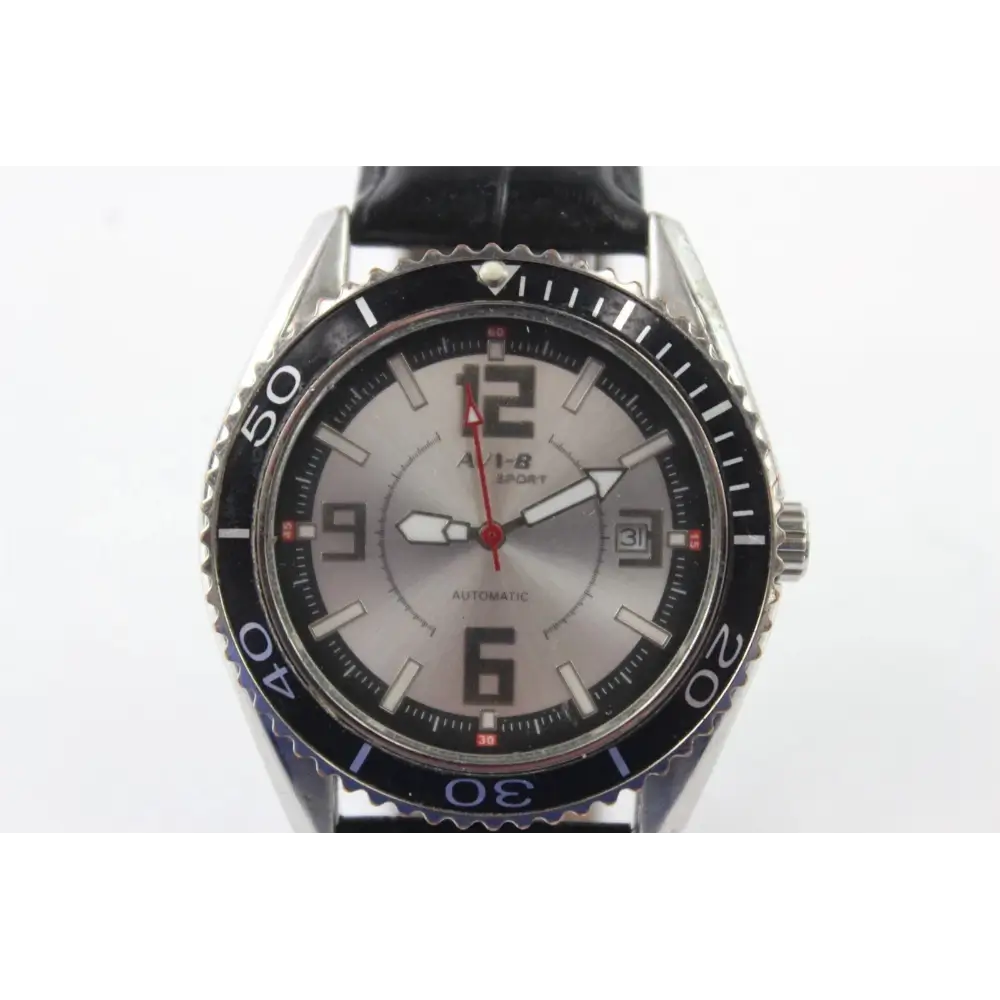 Wristwatch with black strap and silver case on a white background