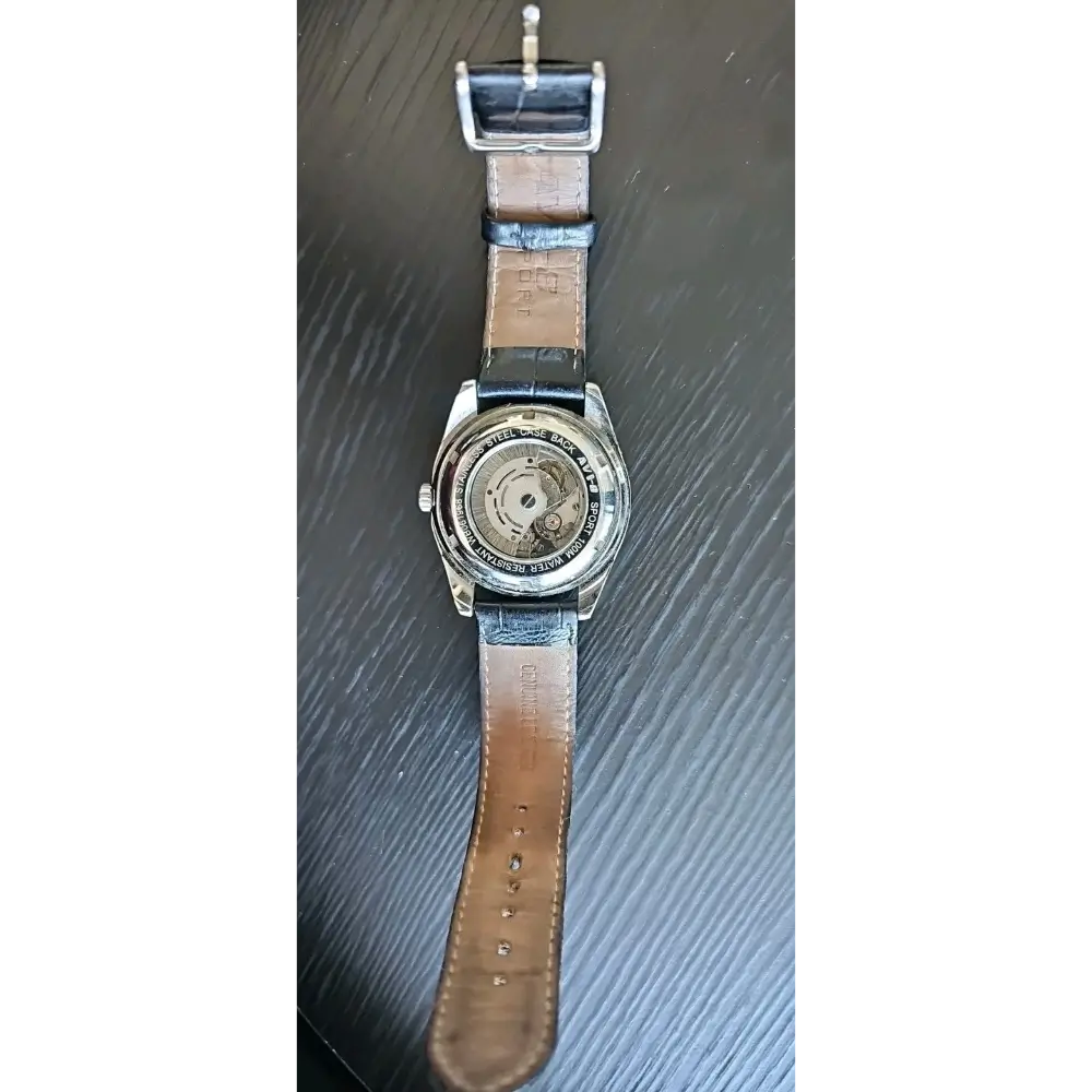 Watch with a brown leather strap