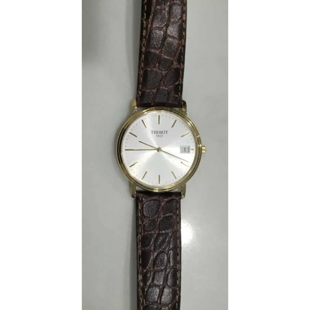 Wristwatch with brown strap and gold case