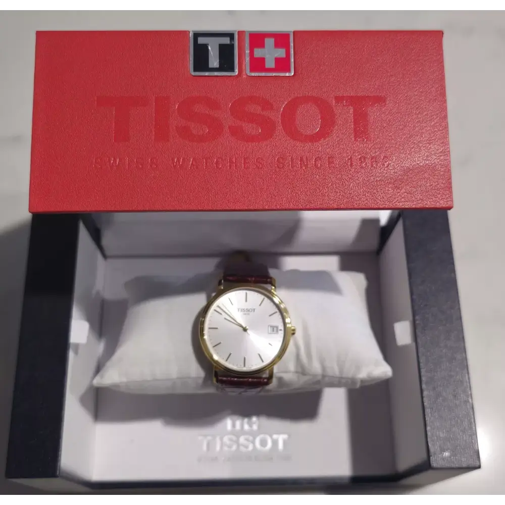 Tissot watch in a red Tissot box