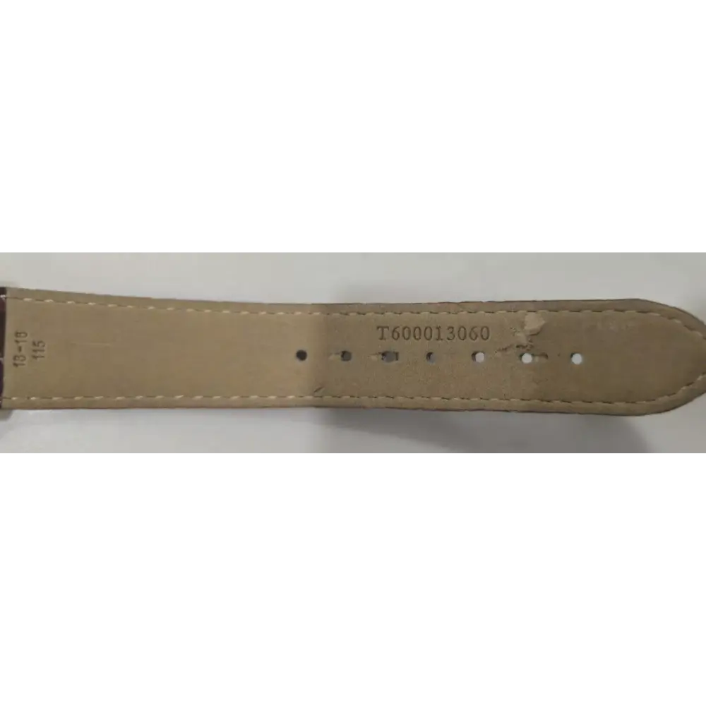 Beige leather strap with visible stitching