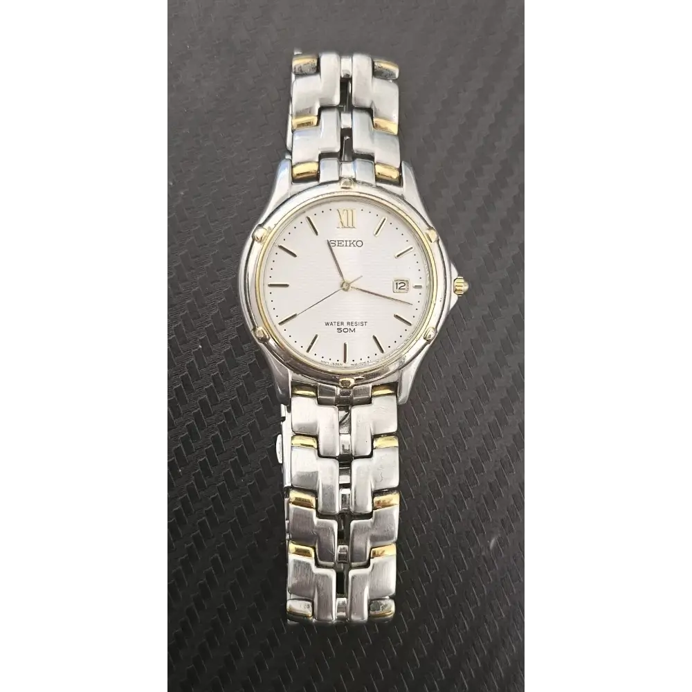 Silver and gold Seiko watch
