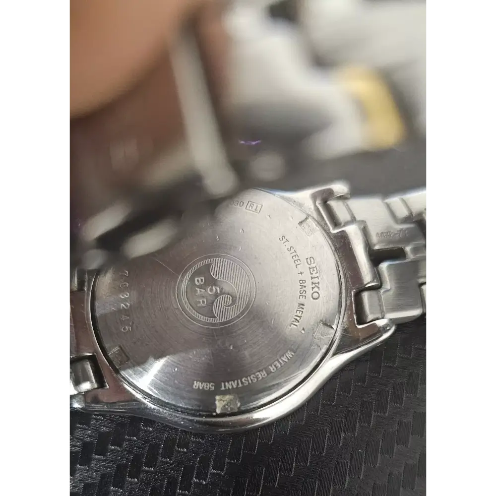 Back view of a Seiko watch with brand logo