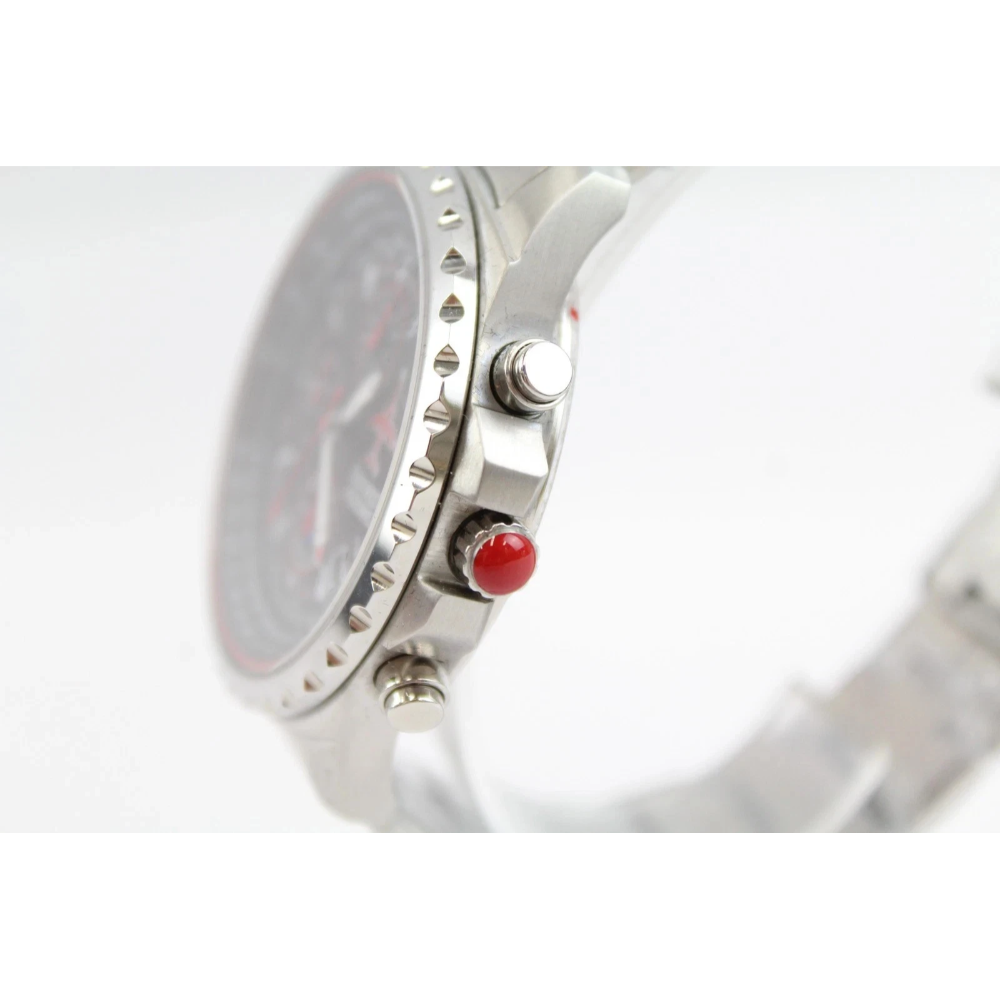 Close-up of a watch with a red accent