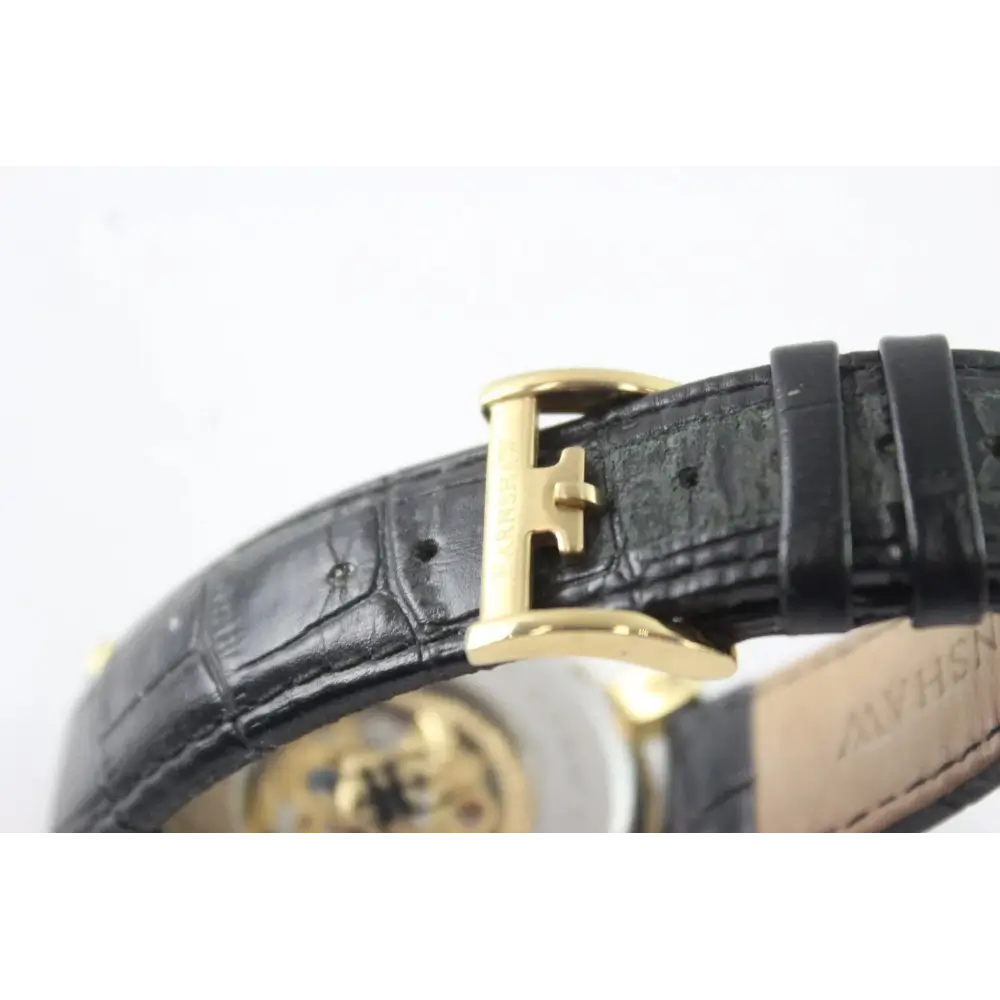 Black crocodile skin watch strap with gold buckle